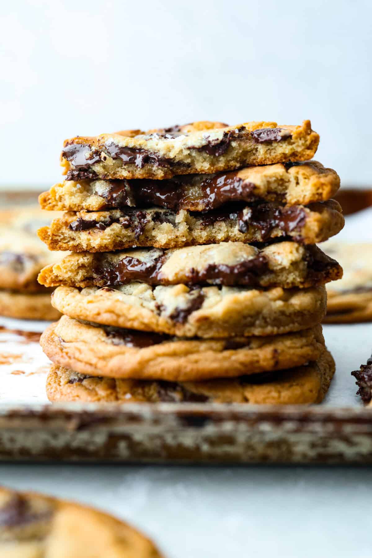 These Jacques Torres Chocolate Chip Cookies Jacques Torres Chocolate Chip Cookies come from the famous “Mr. Chocolate” himself. They were featured in The New York Times’ search for the perfect chocolate chip cookie. The secret is letting the dough rest before baking. It gives you crisp, buttery edges and chewy centers. Stack of Jacques Torres Chocolate Chip Cookies.