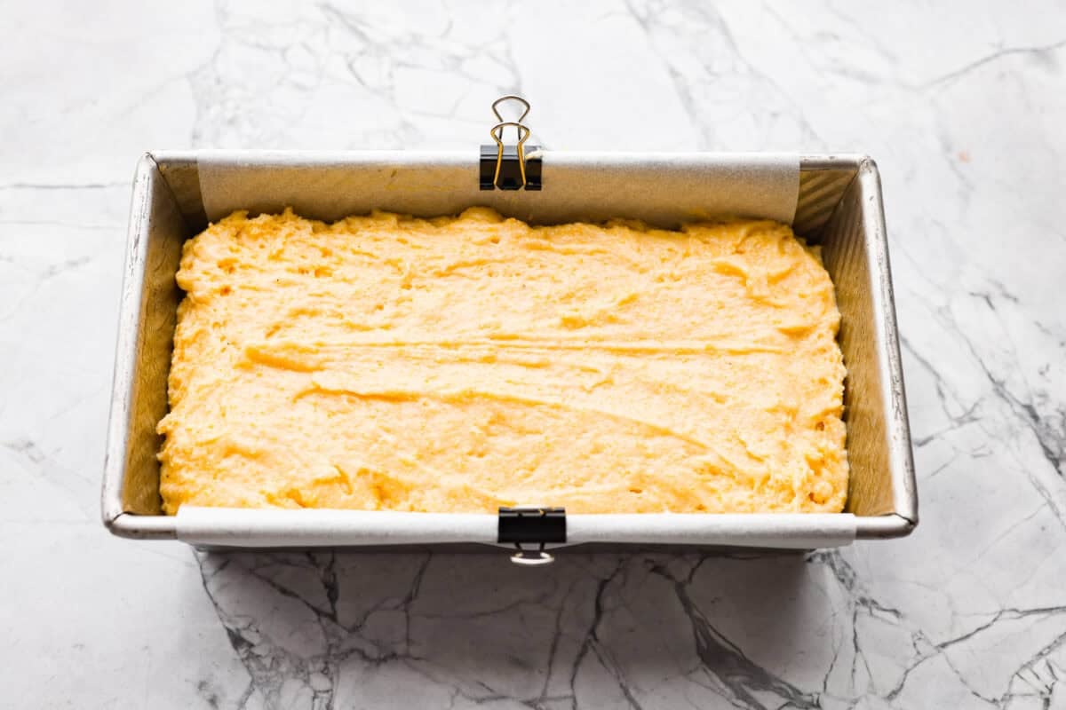 Cornbread loaf batter added to the loaf pan. 