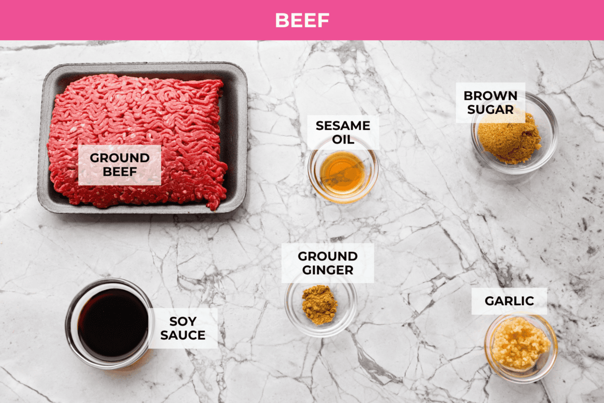 I kept seeing beef broth bowls all over social media, so of course I had to make my own! This easy version has savory ground beef, warm rice, crunchy veggies, and a creamy coconut curry broth. Overhead shot of labeled beef ingredients.