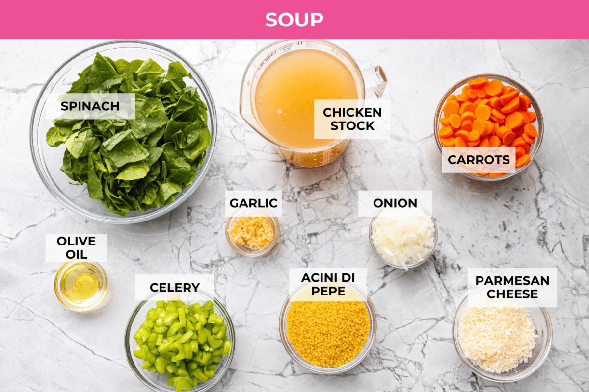 There’s a lot to love about Italian wedding soup! Tender chicken meatballs, vegetables, tiny pasta, and spinach come together in a savory broth for a simple meal that’s hearty, flavorful, and easy to make. Overhead shot of labeled Italian wedding soup ingredients.