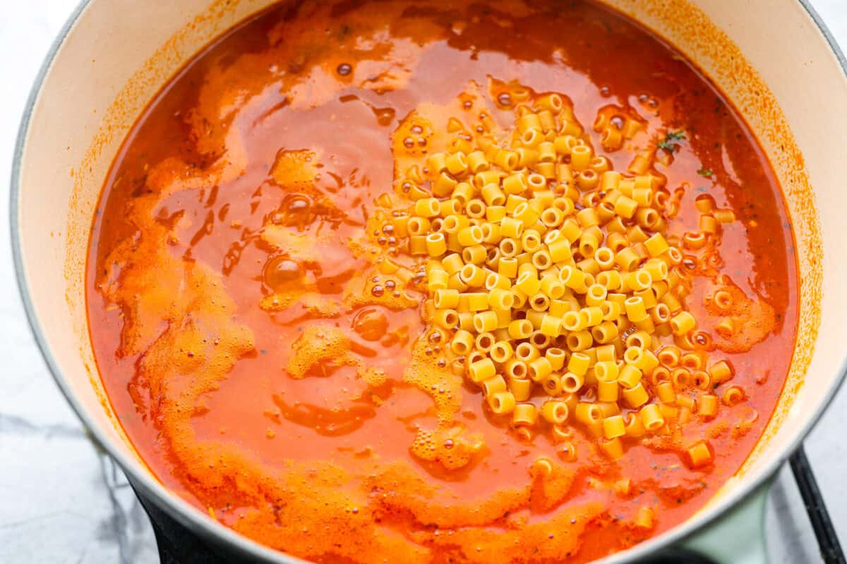 I had to try Stanley Tucci’s pasta fagioli, and his shortcut is so smart! He uses marinara sauce to add tons of flavor without a long list of ingredients. Add creamy beans, tender pasta, kale, and Parmesan, and you have a cozy dinner in just 35 minutes. Pasta added to the pot.