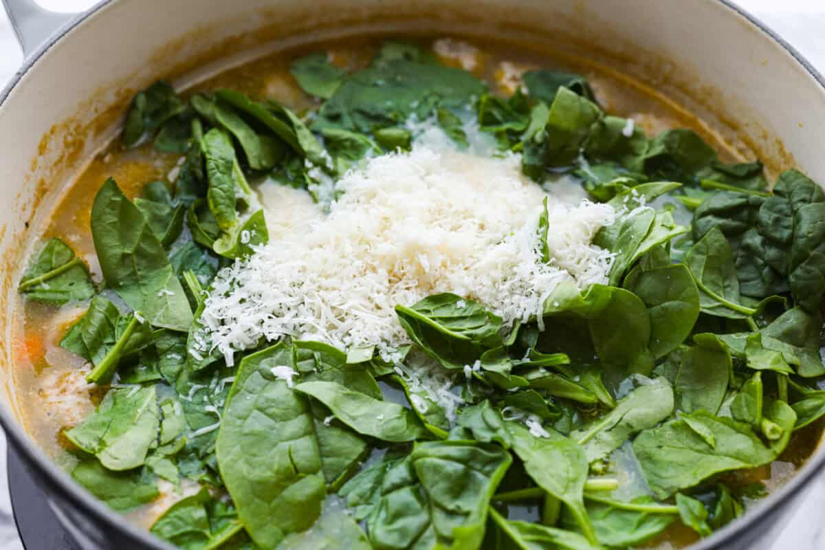 There’s a lot to love about Italian wedding soup! Tender chicken meatballs, vegetables, tiny pasta, and spinach come together in a savory broth for a simple meal that’s hearty, flavorful, and easy to make. Spinach and parmesan cheese added to the soup at the end.