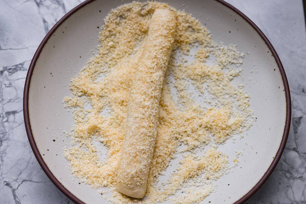 That buttery, garlicky Little Caesars Crazy Bread we all love? You can make it at home, and it's SO good! Soft, fluffy, and covered in Parmesan. Oh, and don't get me started on the garlic butter! Good luck eating just one! Baked breadstick rolled in parmesan cheese.
