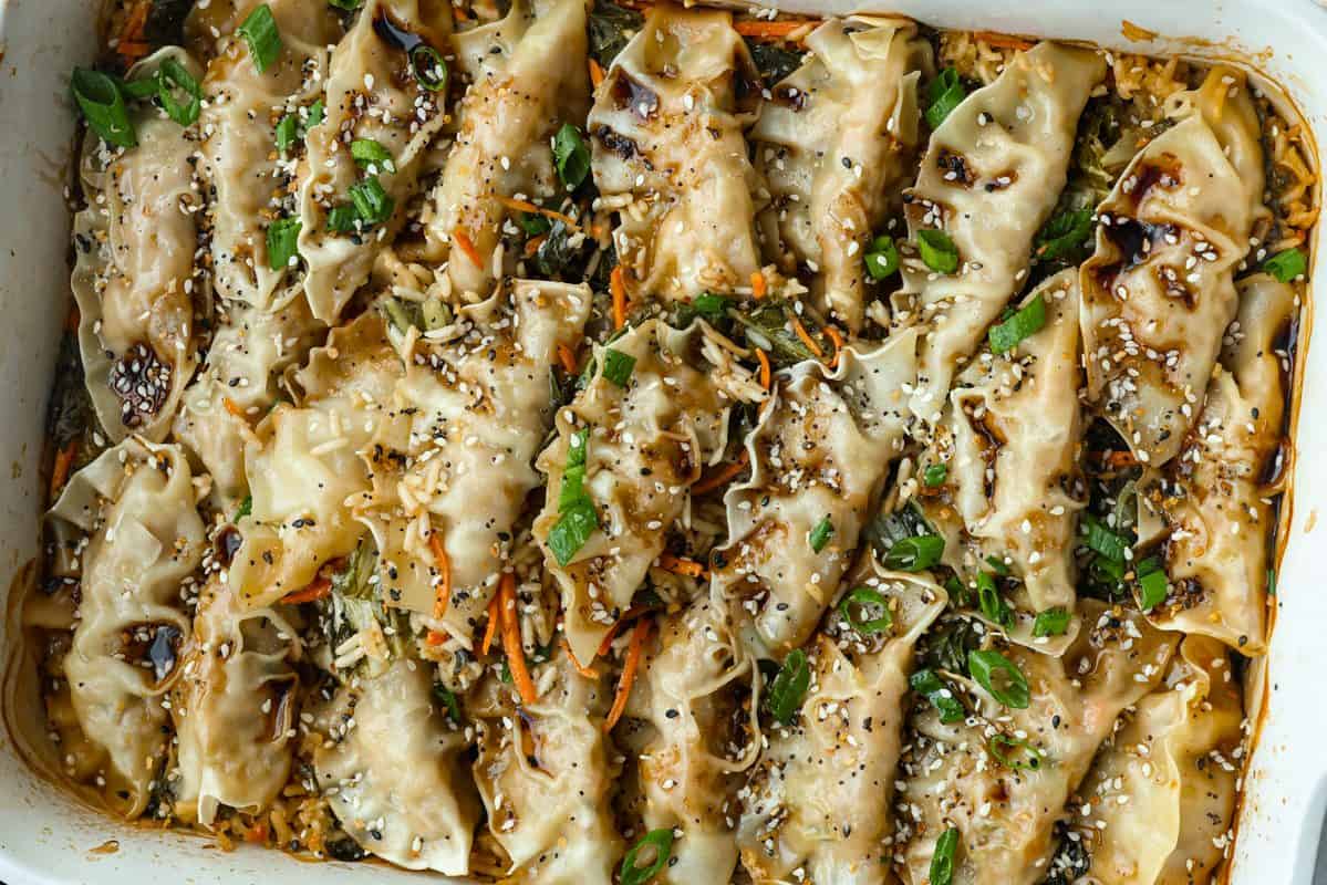 Potsticker and rice bake all finished and garnished with green onions and sesame seeds.