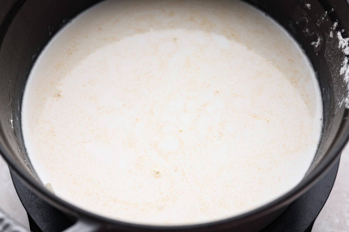 My creamy chicken gnocchi soup has everything I love about the Olive Garden favorite: tender chicken, pillowy gnocchi, fresh vegetables, and a rich, creamy broth. Even better, it comes together in just 30 minutes! Half and Half and chicken broth added to the pot.